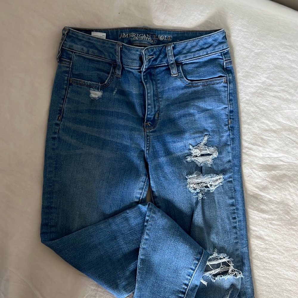 Blue ripped skinny jeans